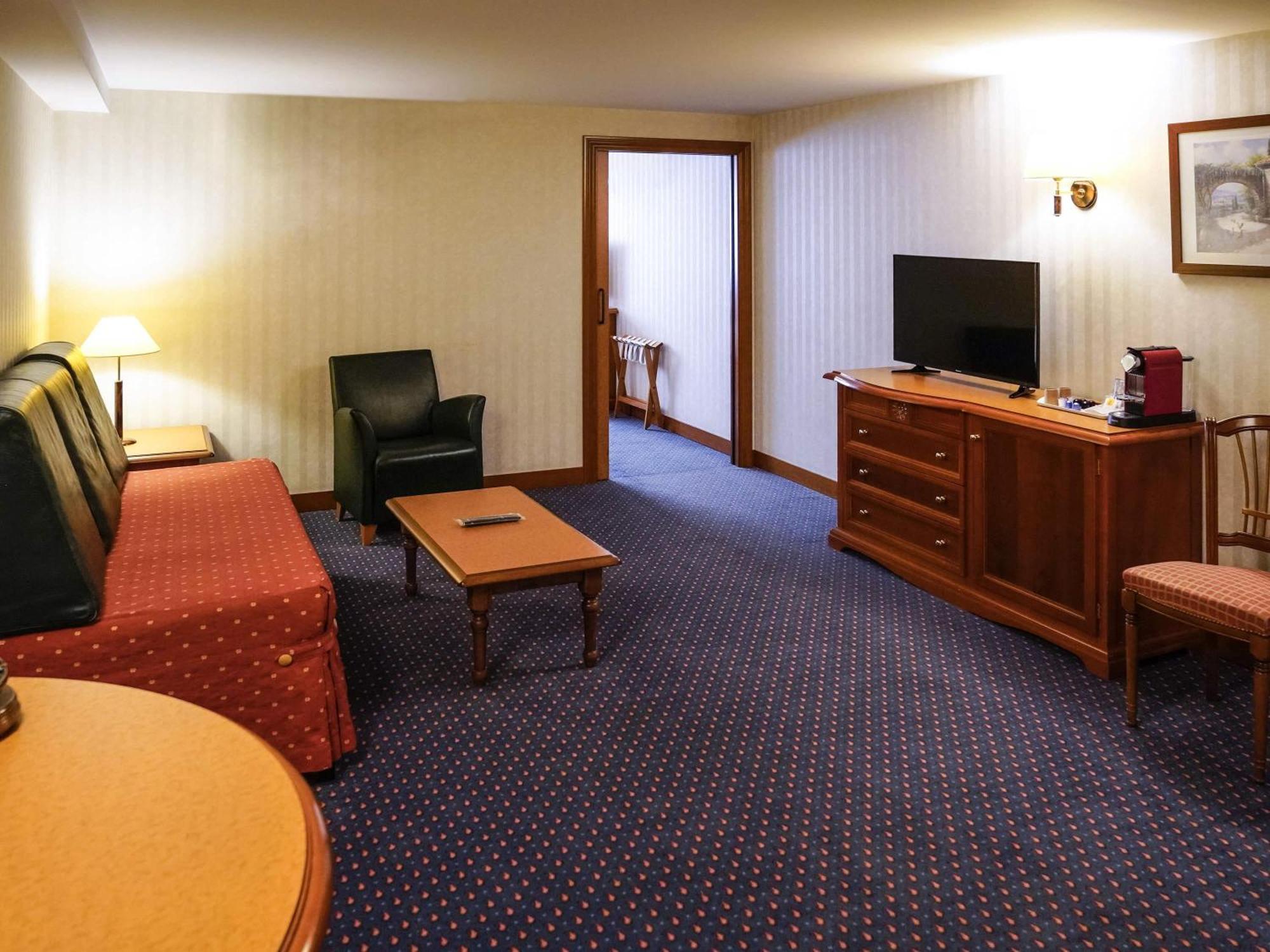 Chambre supérieure avec 1 lit double et 2 lits simples - Non-fumeurs